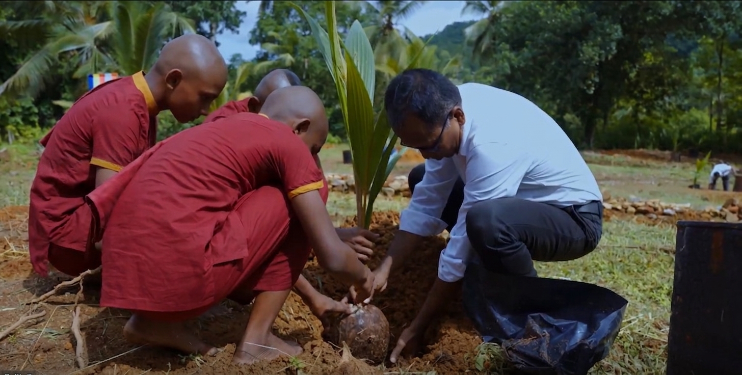 Students of Noble International School planting coconut saplings in Baddegama for Vimukthi Foundation sustainable food security initiative