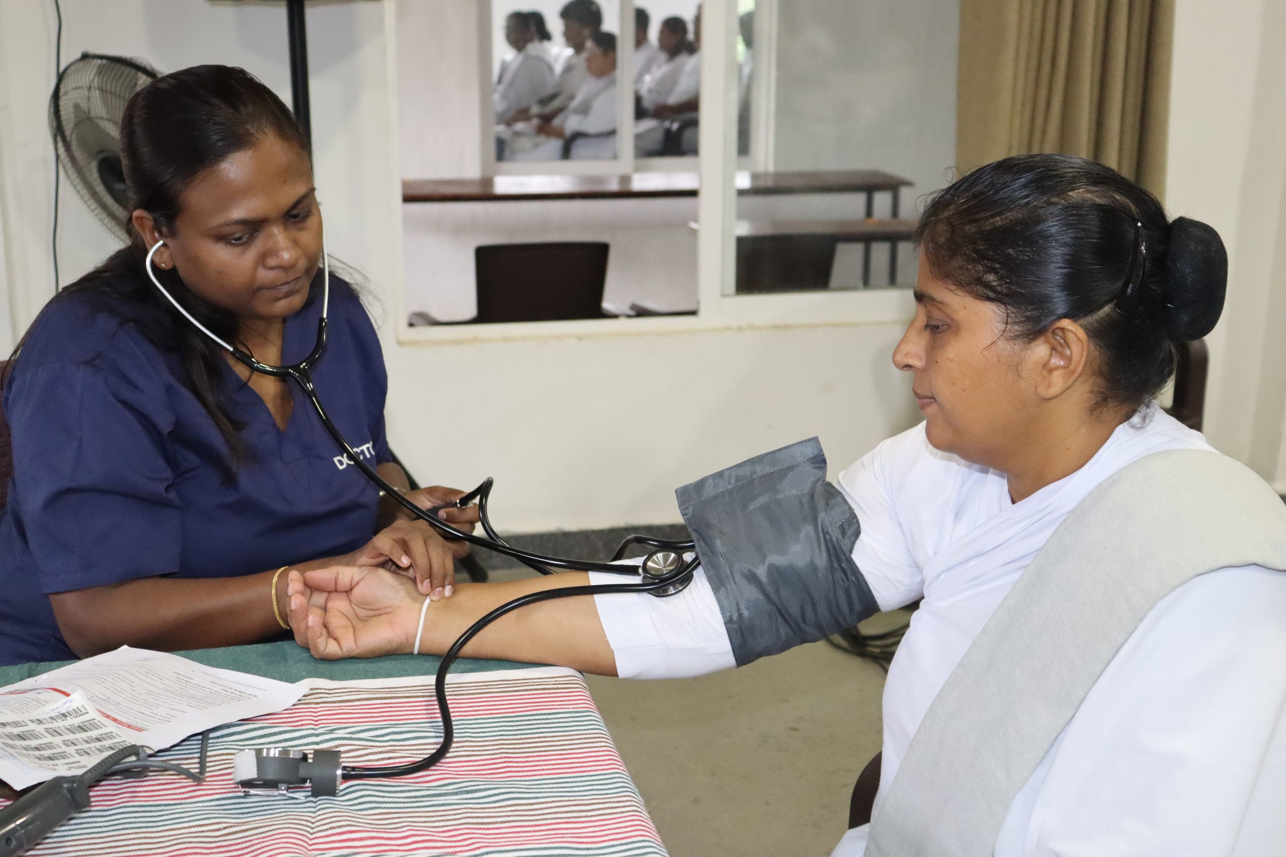 Nurse checking blood pressure of a donor during the Vimukthi Foundation Noble Blood Donation camp
