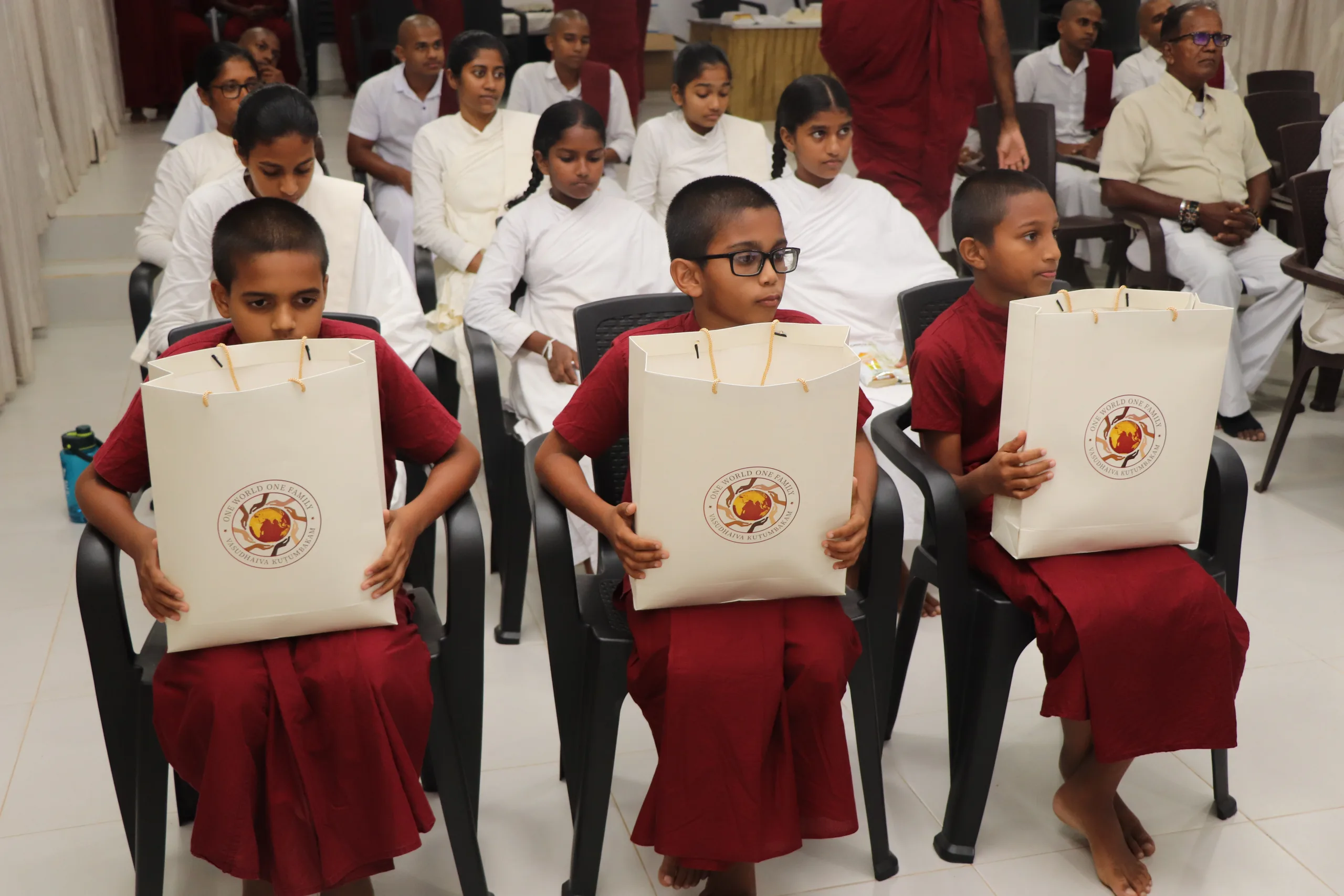 Children receiving SaiSure nutrition drinks under the Cups of Care initiative at Noble Hearts