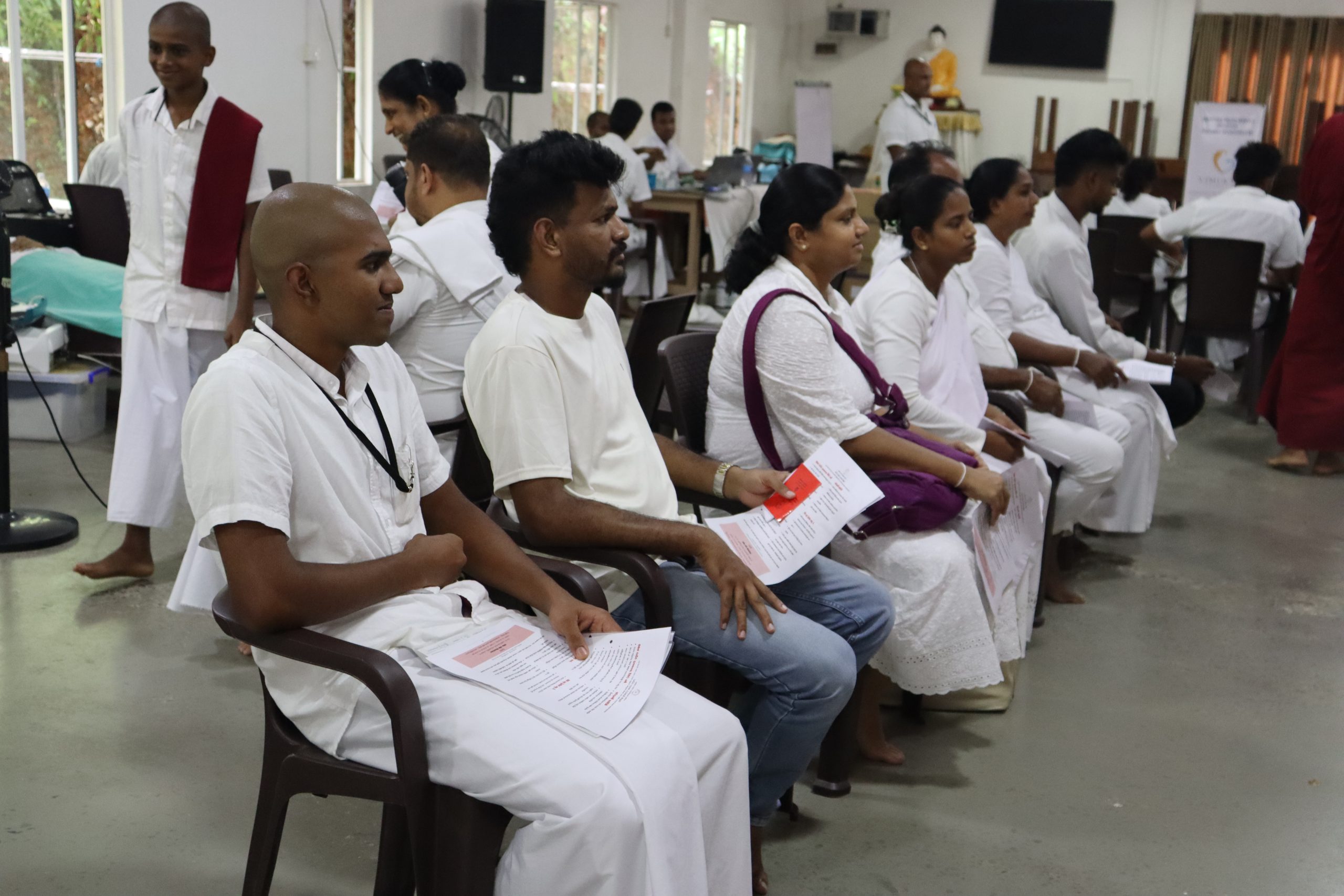 Donors and community members waiting in line to participate in the Vimukthi Foundation blood donation drive