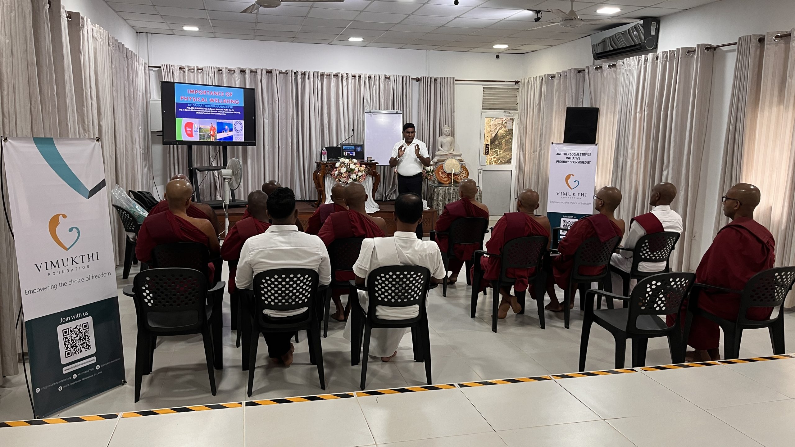 Participants gathered in a hall attending a physiotherapy training session organized by Vimukthi Foundation Noble Healthcare.