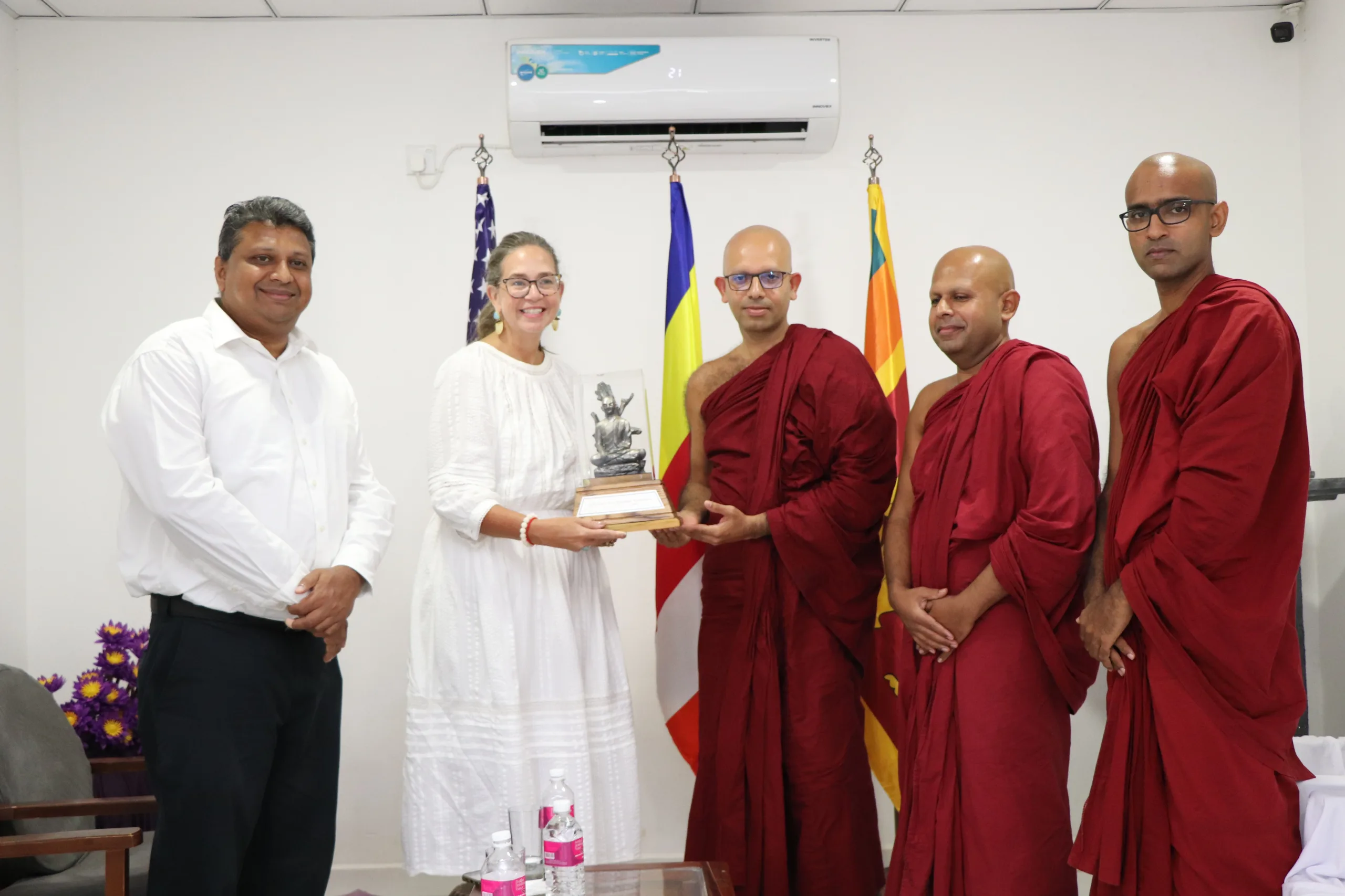 Vimukthi Foundation leadership presenting a token of appreciation to U.S. Chargé d'Affaires in Sri Lanka