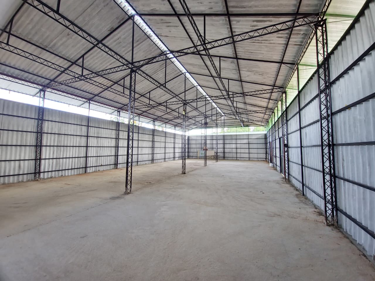 Spacious interior of the newly built granary and rice storage facility at Vimukthi Foundation Dambulla farm